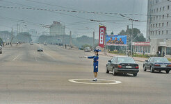north-korean-traffic-police-no-cars-1.jpg
