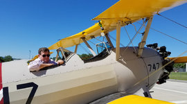 Catching a ride in a Bi-Plane.jpg
